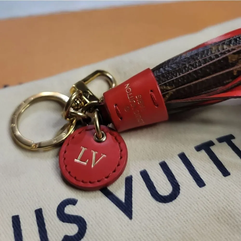 Louis Vuitton Leather Tassel Keychain In EUC FULL INCLUSION